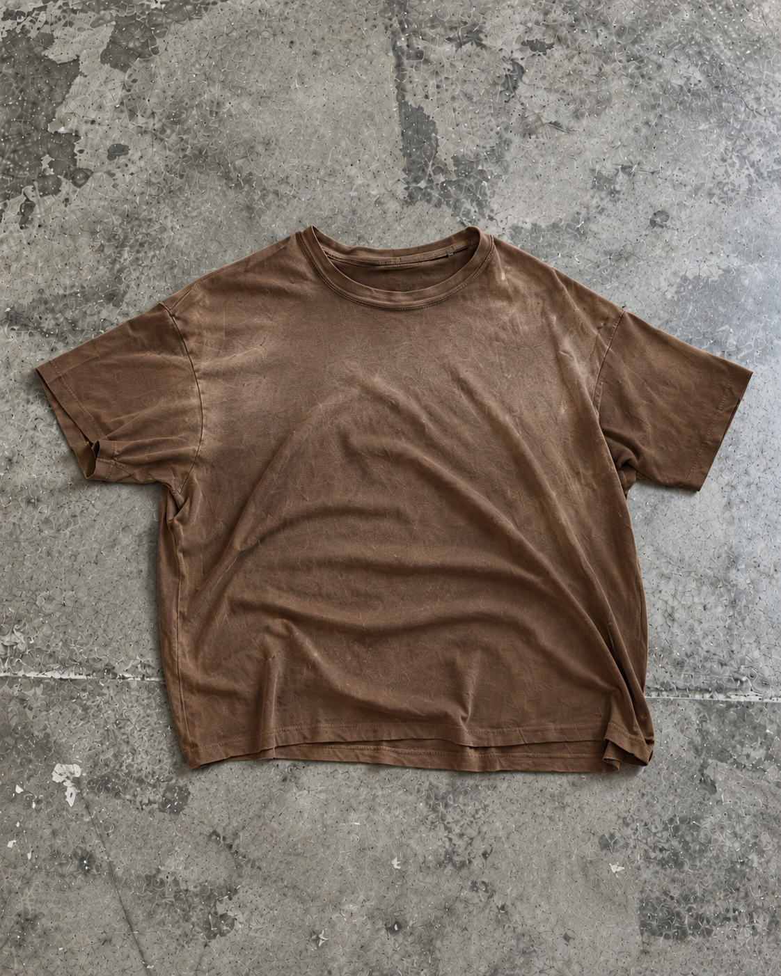 California Tee in Mocha, laid flat on concrete