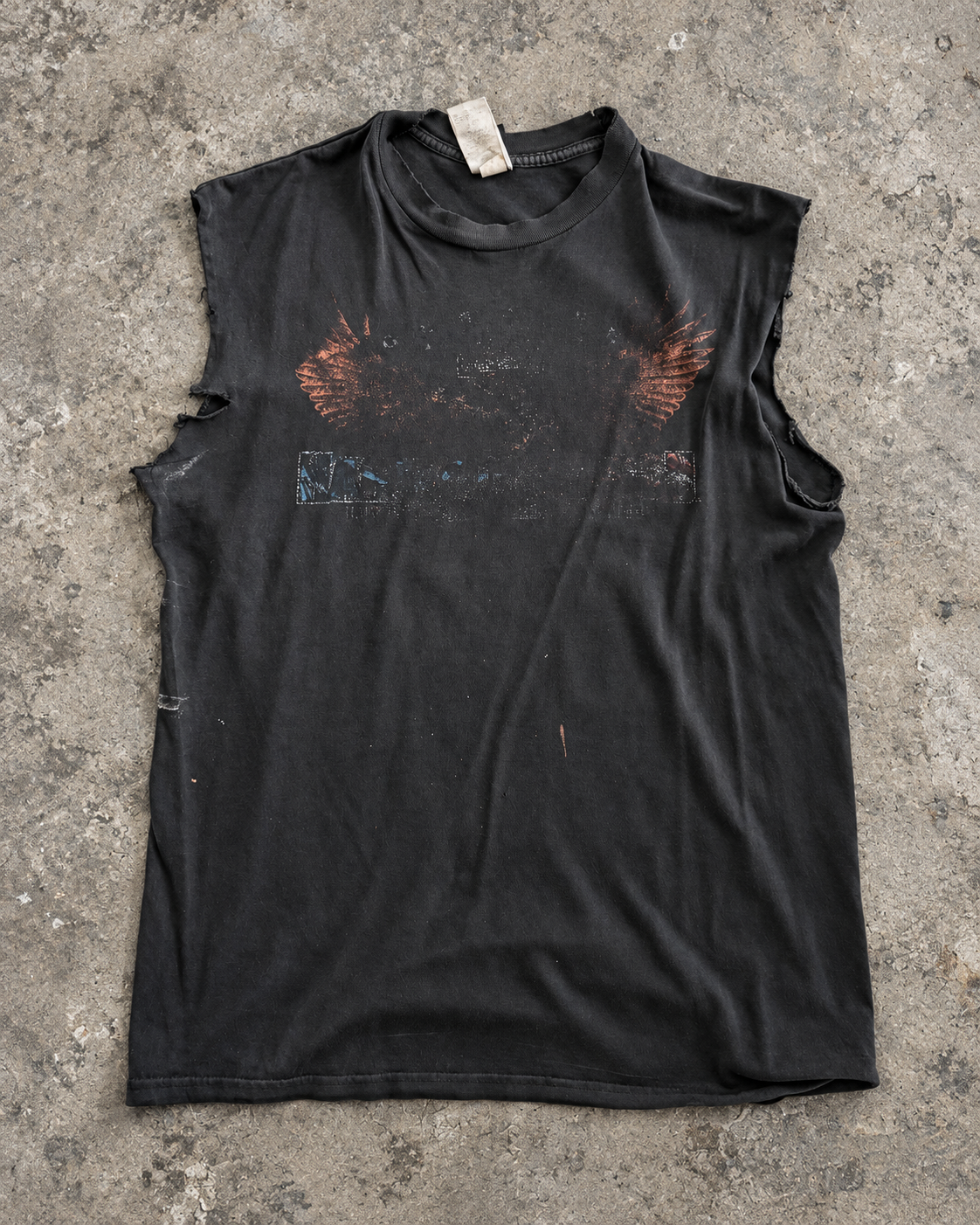 Vintage 2001 Harley-Davidson sleeveless tee, front, laid flat on concrete
