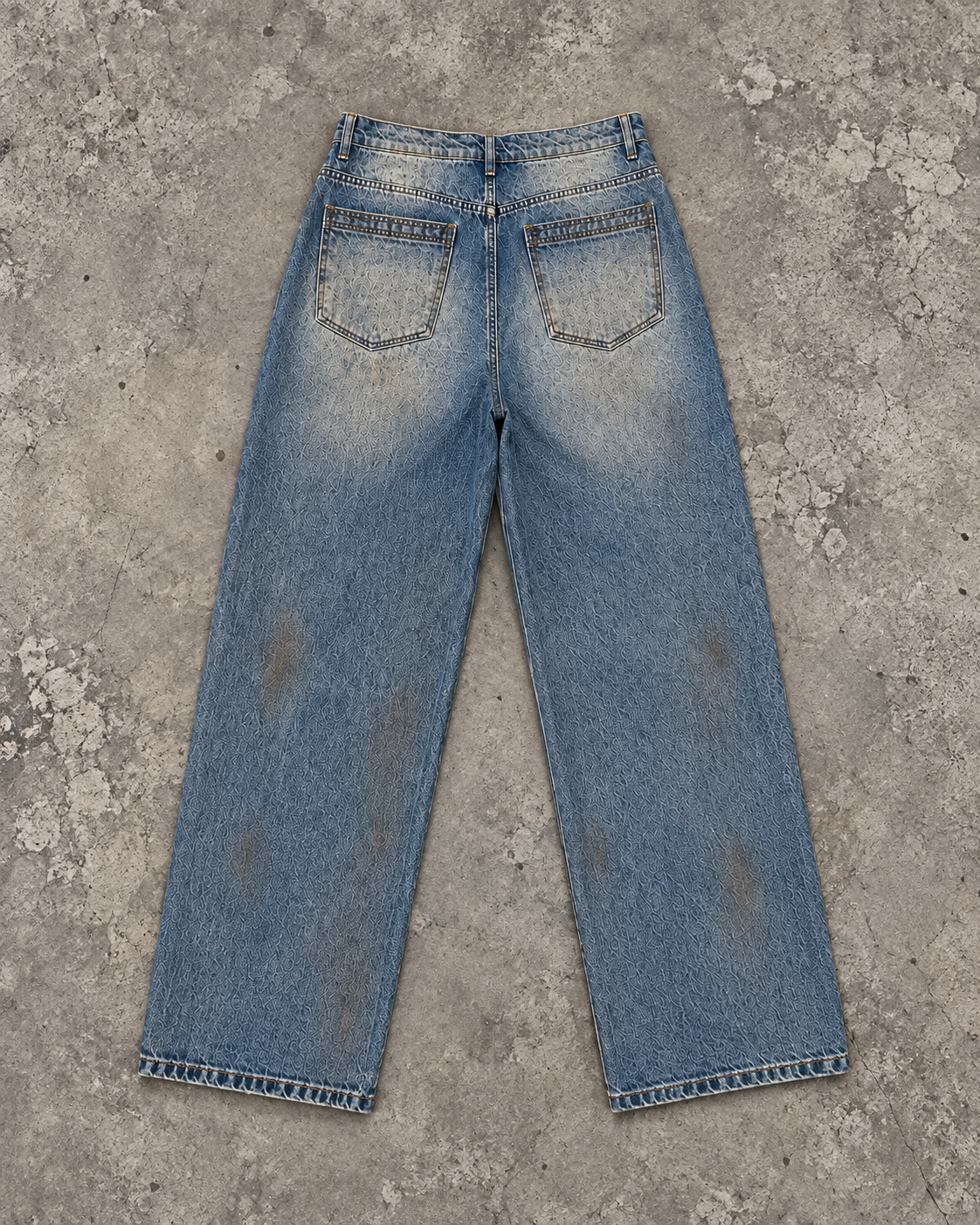 Dirty Vintage Baggy Denim, back, laid flat on concrete